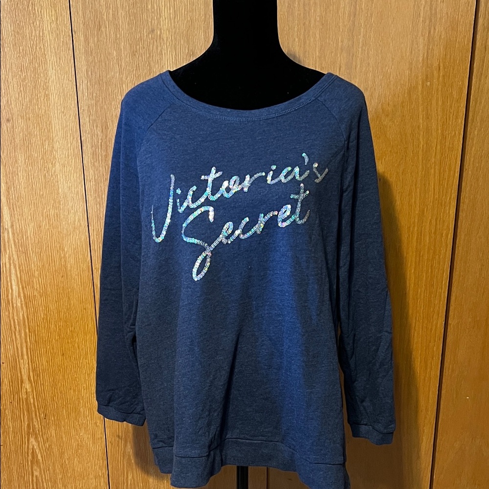Victoria’s Secret three-quarter sleeve blue sweatshirt. Sz. L . great. Cond.